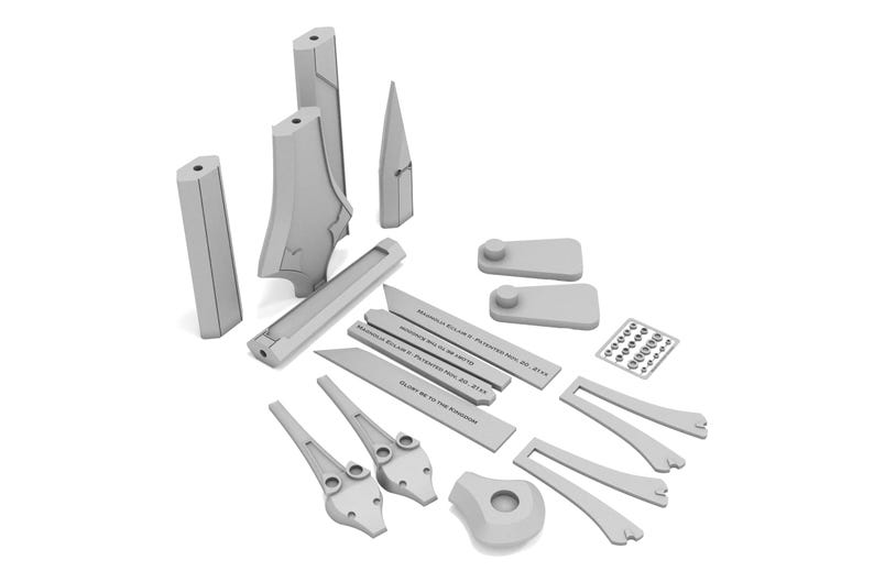 May include: A collection of light gray 3D-printed components, including rectangular bars, angled pieces, and various geometric shapes. Some pieces have text. The objects are arranged on a white background.