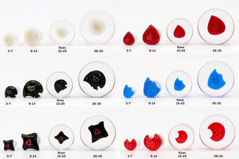 May include: Set of six pairs of ear gauges in various colors and designs, including black, white, red, blue, and green. Each pair comes in three sizes: 3-7 mm, 8-14 mm, and 15-25 mm. The largest size is 26-35 mm.