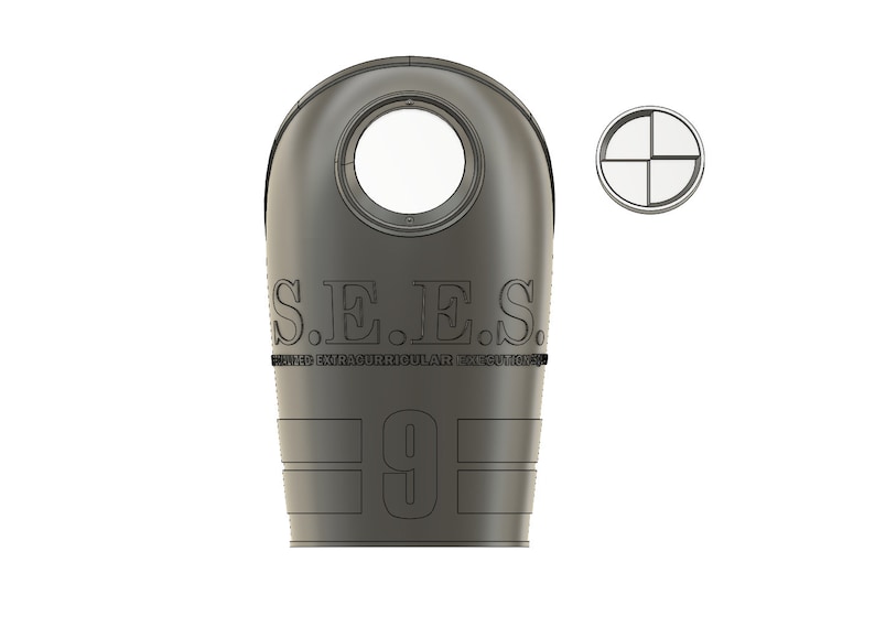 May include: A gray, stylized object with a circular opening and the text "S.E.E.S. ENHANCED EXTRACURRICULAR EXECUTIONS" and the number "9". A smaller circular design is also present.