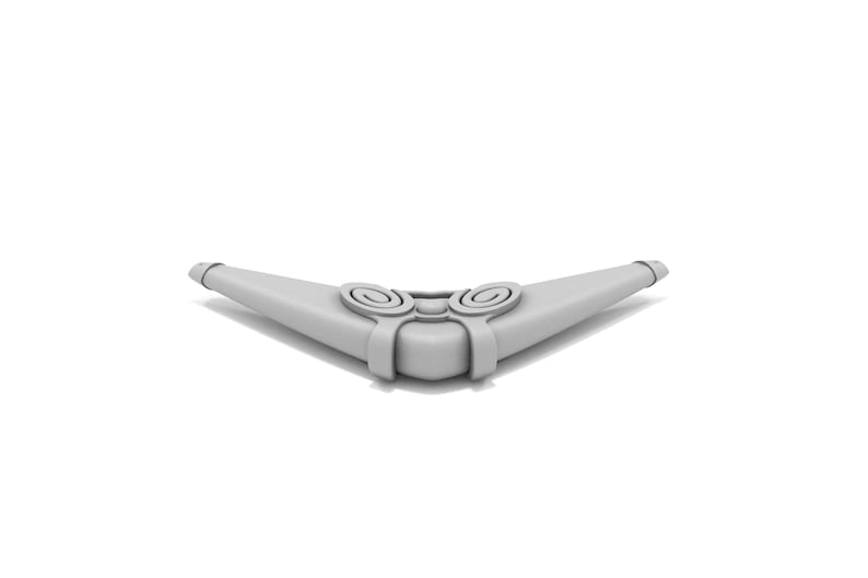 Puede incluir: Un kazoo de pl&aacute;stico blanco con dos agujeros circulares en la parte superior.