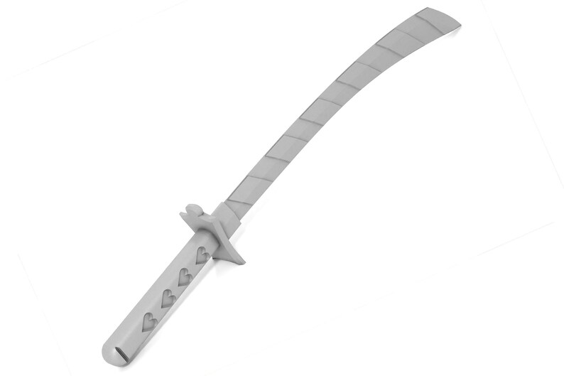 May include: A silver-colored sword with a curved blade and a handle decorated with hearts.