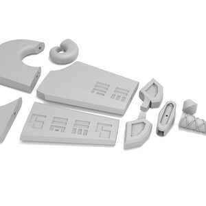 May include: A set of gray plastic pieces that can be assembled into a model of a spaceship. The pieces include a large wing, a smaller wing, a cockpit, a tail fin, and a small, round piece.