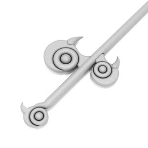 May include: A white, decorative, metal spearhead with three circular designs. The spearhead is attached to a long, thin, white shaft.