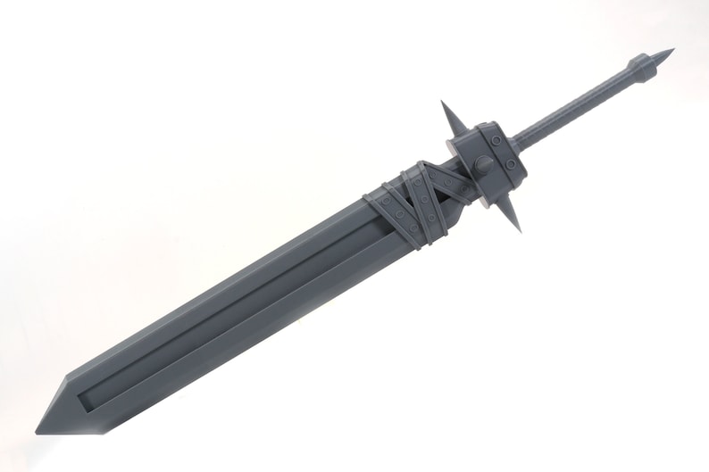 May include: A grey, metal sword with a pointed tip and a textured handle. The sword has a long, straight blade and a decorative design on the handle.