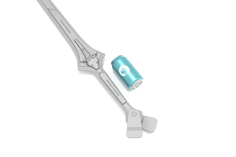 May include: A light gray sword-shaped object with a teal can. The sword has a detailed design with text along the blade. The can is teal with a white circular logo. The objects are on a white background.