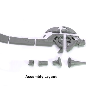 May include: Assembly layout for a 3D printed sword with multiple pieces. The sword is gray and has intricate details. The pieces are laid out on a white surface.
