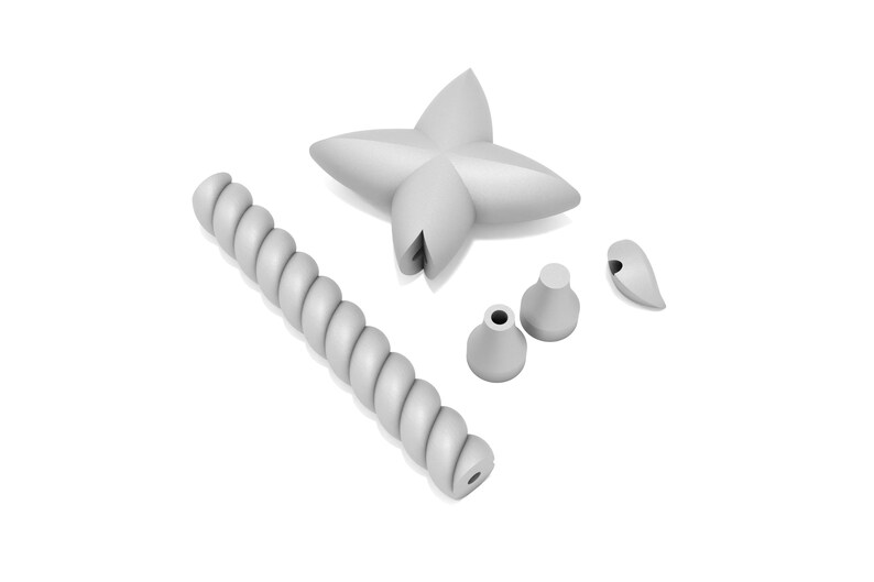 May include: A set of five gray silicone molds for making candles. The molds include a star, a twisted rope, and three different sized teardrop shapes.