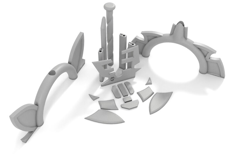 May include: A set of gray plastic building blocks with various shapes and sizes. The blocks are arranged in a circular pattern, with a tall, thin block in the center.