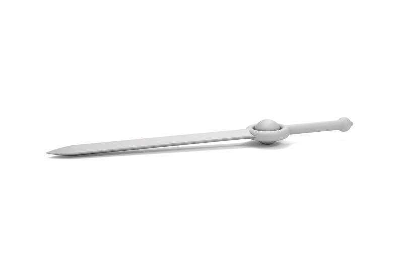 May include: A white sword with a round pommel. The sword is lying on a white surface.