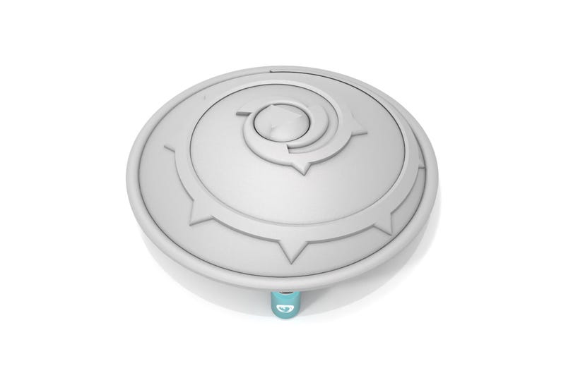 Puede incluir: Un disco de pl&aacute;stico blanco con un dise&ntilde;o en espiral y un peque&ntilde;o bot&oacute;n redondo en el centro. El disco tiene un borde texturizado con una serie de puntos.