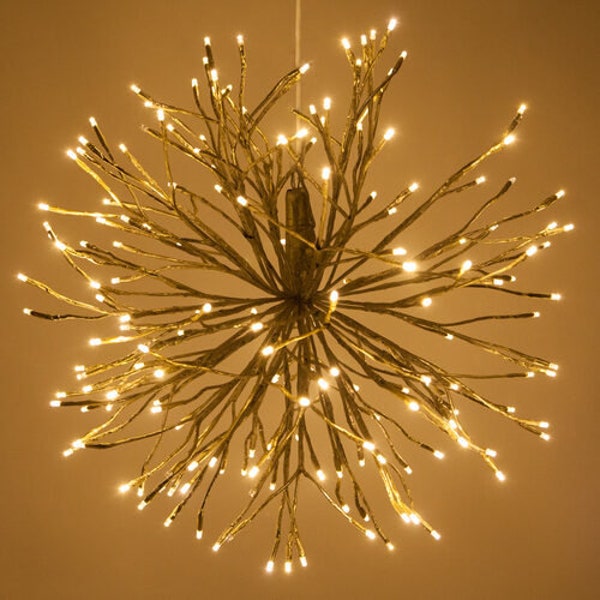 Ramas iluminadas Starburst doradas de 24", LED blanco cálido, centelleo