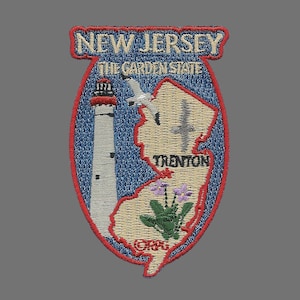 May include: Embroidered patch featuring the outline of the state of New Jersey, with the words "New Jersey" and "The Garden State" at the top. The patch also includes a lighthouse, a bird, and the word "Trenton".
