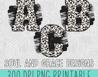 May include: A set of three black and white alphabet letters, A, B, and C, with a black and white spotted pattern. The letters are outlined in black and have a brushstroke effect. The letters are on a white background with a black and white geometric pattern. The text "SOUL AND GRACE DESIGNS 300 DPI PNG PRINTABLE ENTIRE ALPHABET INCLUDED" is at the bottom of the image.