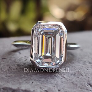 Emerald cut engagement ring with a sleek and elegant design.