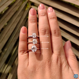 claw prong oval moissanite ring