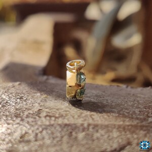 Rear perspective of the Moissanite pendant, highlighting the intricacies of the 14kt yellow gold setting