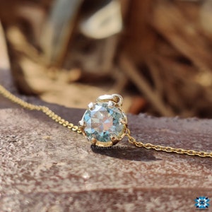 Old European Cut Moissanite showcased in a delicate six-prong setting