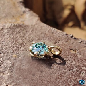 Model displaying the solitaire pendant, a stunning addition to any outfit