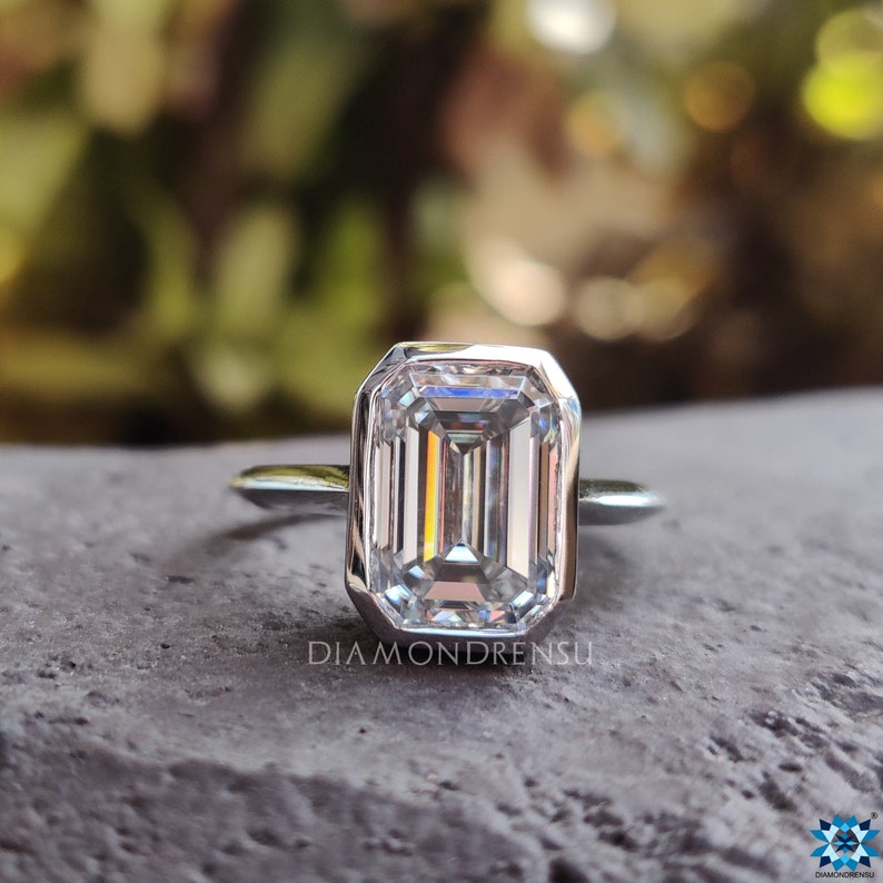 Emerald cut engagement ring with a sleek and elegant design.