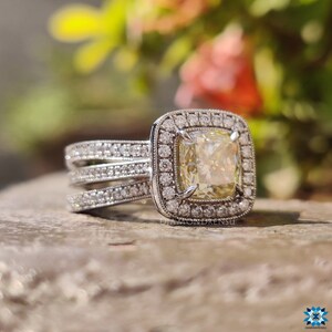Crushed ice cushion cut ring glowing with intense brilliance.