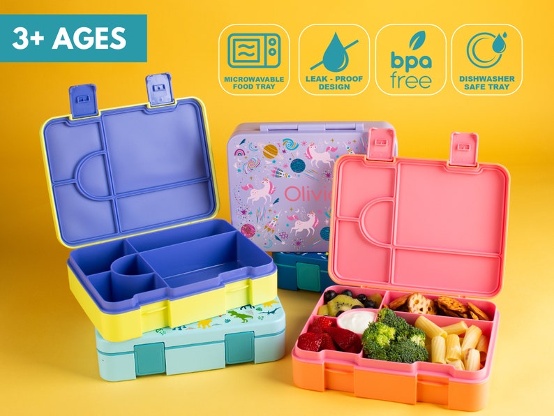 May include: Three colorful lunch boxes with different designs. The lunch boxes have multiple compartments and are leak-proof, microwave safe, and dishwasher safe. The lunch boxes are BPA free. The text "3+ AGES" is on the top left corner of the image.