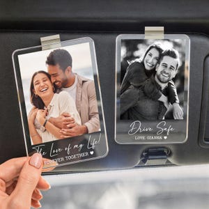 May include: Two clear acrylic photo car visor clips. One features a color photo with the text "The Love of my Life! FOREVER TOGETHER." The other is a black and white photo with the text "Drive Safe LOVE, GIANNA".