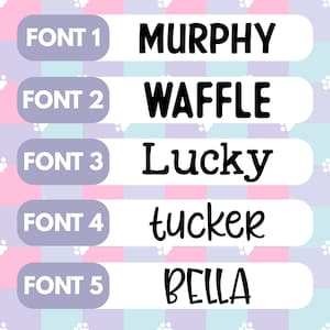 May include: Five different fonts displayed on a purple and pink background with paw prints. The fonts are labeled "FONT 1" through "FONT 5". The names "MURPHY", "WAFFLE", "LUCKY", "TUCKER", and "BELLA" are displayed in each font.