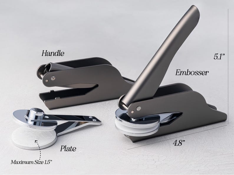 May include: Three gray metal embossers with silver accents are displayed. The largest embosser is 5.1 inches tall and 4.8 inches wide. The plate has a maximum size of 1.5 inches. The image includes the words "Handle", "Embosser", and "Plate".