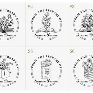 May include: A collection of six black and white circular designs featuring the text "FROM THE LIBRARY OF" and the name "Susanne Dawson". Each design includes an open book or stack of books with floral elements. One design has a butterfly.