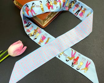 乗馬にインスパイアされた細身のシルキースカーフ | 5 x 92 cm | 100% ポリエステル