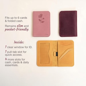 May include: A collection of leather wallets in pink, burgundy, and yellow. The pink wallet features a floral design. The open yellow wallet reveals a clear ID window, a pull-tab slot, and multiple card slots. The text indicates the wallets hold up to 6 cards and folded cash.