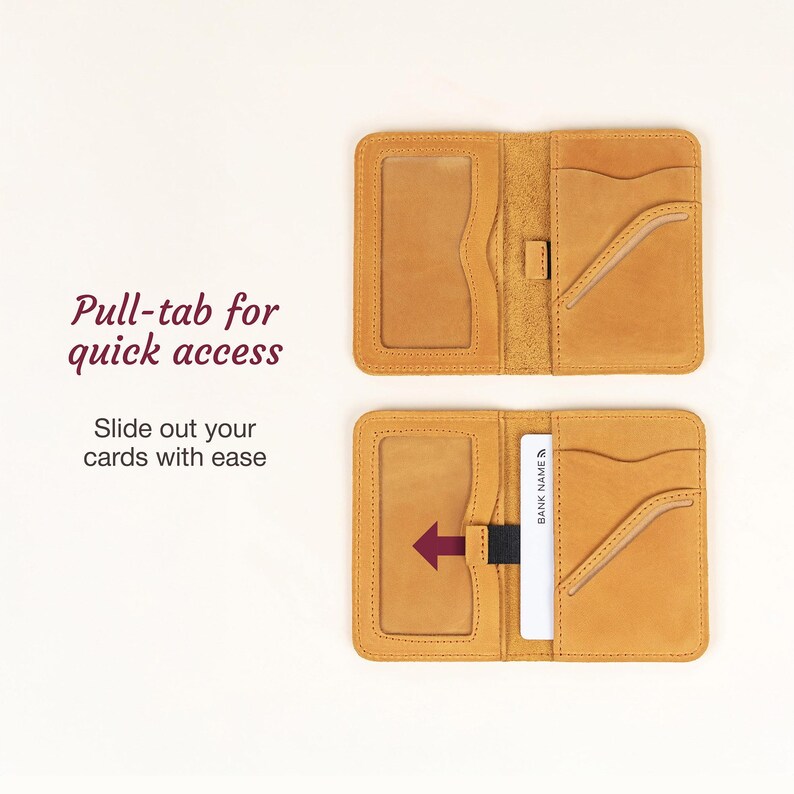 May include: Open, tan leather wallet with multiple card slots and a clear ID window. The wallet features a pull-tab for quick access and the text "Pull-tab for quick access" and "Slide out your cards with ease".