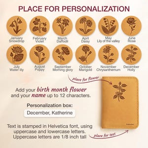 May include: A tan leather wallet with a floral design and the name "Katherine" engraved. The image shows 12 circular designs with birth month flowers and text that reads "PLACE FOR PERSONALIZATION". The text "Add your birth month flower and your name up to 12 characters."