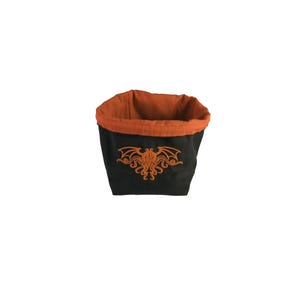 Arkham Horror Monster Cup, Reversible drawstring dice bag with toggle closure and square base. Ideal for D&D, board games, wargames. Features embroidered design and plain color side. Great gift for tabletop gamers