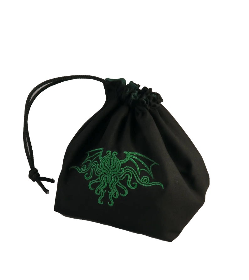 Green Arkham Horror Draw Bag, Reversible drawstring dice bag with toggle closure and square base. Ideal for D&D, board games, wargames. Features embroidered design and plain color side. Great gift for tabletop gamers