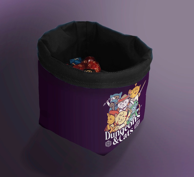 Black Cat Dice Bag for DND – Gift for Gamers and Cat Lovers!
Bring a touch of feline charm to your next Dungeons & Dragons session with this handcrafted Cat Dice Bag, featuring a whimsical Dungeons and Cats tile pattern.
🧵 Soft, durable cotton blend exterior with a secure drawstring closure
🎁 Great gift for D&D players, cat lovers, and geeky gamers
🖐️ Handmade with care in the UK
Makes a quirky stocking stuffer, birthday gift, or surprise treat for your party’s bard, rogue, or dungeon master.