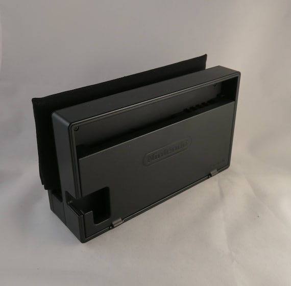 Switch dock back cover outlet
