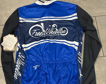 Maglia da ciclismo a maniche lunghe Sugoi Freewheelin Foundation blu taglia L NWT