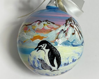 Antarctica hand painted ornament, custom travel ball, South Pole landscape with penguins and whales. I remember traveling with a friend.