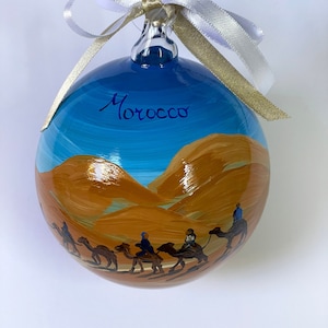 Morocco Christmas ornament, desert with camels and tent, souvenir adventure trip, Marrakech Sahara desert, magnificent oasis tour.