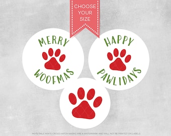 May include: Three white round stickers with red paw prints and green text. The stickers say "Merry Woofmas", "Happy Pawlidays", and just a paw print.