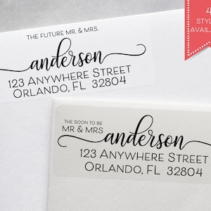 May include: Two white address labels with black text. The top label reads "The Future Mr. & Mrs. anderson 123 Anywhere Street Orlando, FL 32804". The bottom label reads "The Soon to Be Mr. & Mrs. anderson 123 Anywhere Street Orlando, FL 32804".