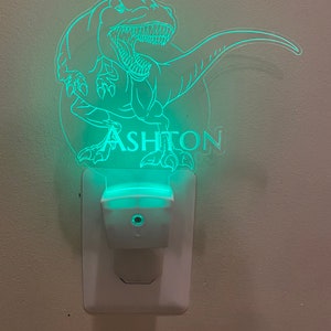 Tyrannosaurus Rex Dinosaur Plug in LED Night Light featuring a choice of any name engraved