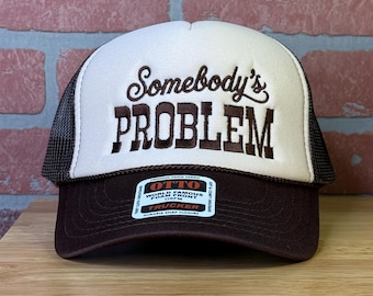 Somebody's Problem Embroidered on a Mid Profile Foam Trucker Hat