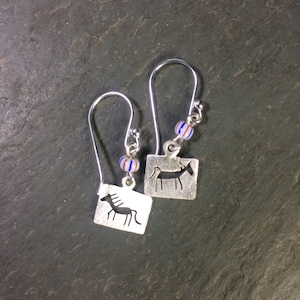Sterling silver horse petroglyph earrings with trade bead.