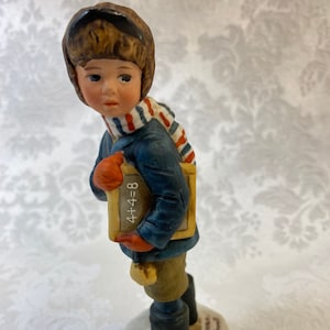 School boy Porcelain Figurine by Dave Grossman (1973) from a Norman Rockwell Drawing (1927)