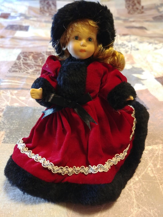 porcelain doll red velvet dress