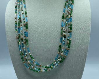 Obinrin ti Okun "Beach Woman" Necklace