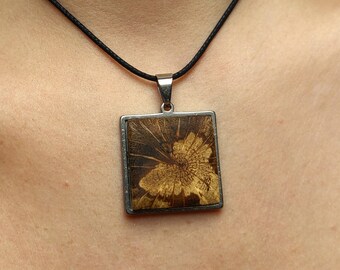 Delicate, square, silver pendant made of cork oak wood