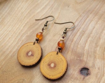 Natural wooden earrings made of light wood with orange gemstone beads carnelian